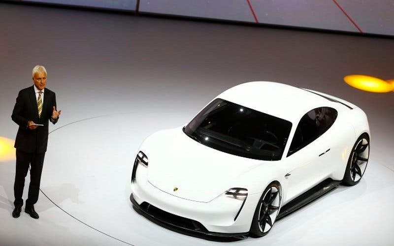 Porsche CEO Matthias Mueller presents the new electric Porsche Mission E concept car during the Volkswagen group night ahead of the Frankfurt Motor Show (IAA) in Frankfurt, Germany, September 14, 2015. REUTERS/Kai Pfaffenbach