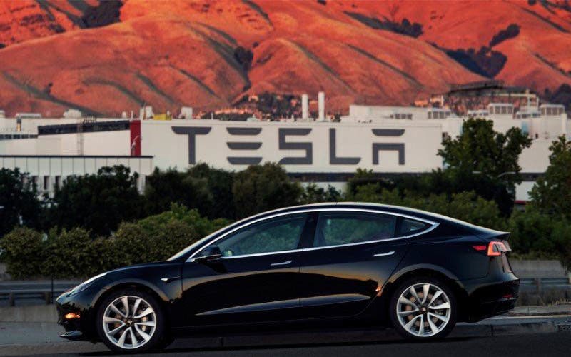 FILE PHOTO: First production model of Tesla Model 3 out the assembly line in Fremont, California , U.S. is seen in this undated handout photo from Tesla Motors obtained by Reuters July 10, 2017. Tesla Motors/Handout via REUTERS