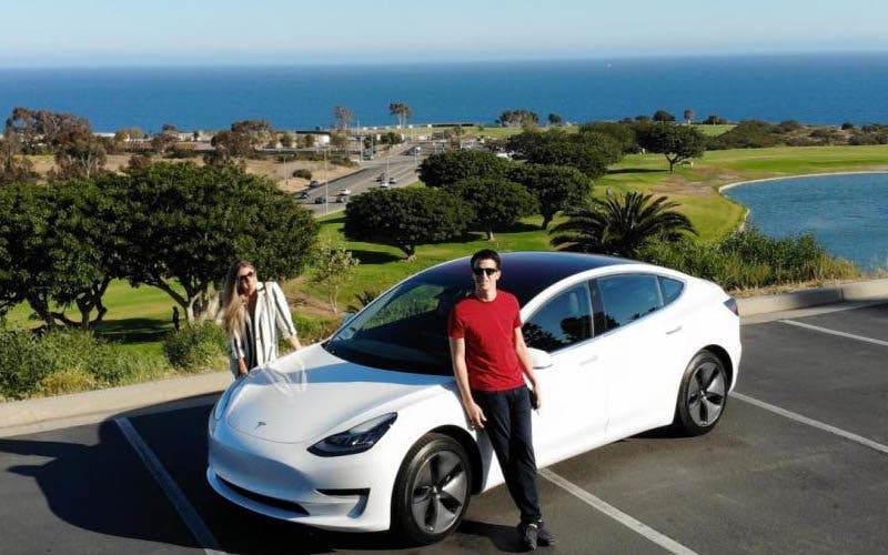 his-points-are-worth-least-5000-airfare-and-hotels-pictured-keith-rosso-and-his-wife-their-tesla-california
