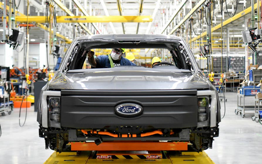 One year after Ford confirmed construction of the Rouge Electric Vehicle Center in Dearborn, Mich., the first Ford F-150 Lightning pre-production units begin leaving the factory. Pre-production model shown. F-150 Lightning available starting spring 2022.