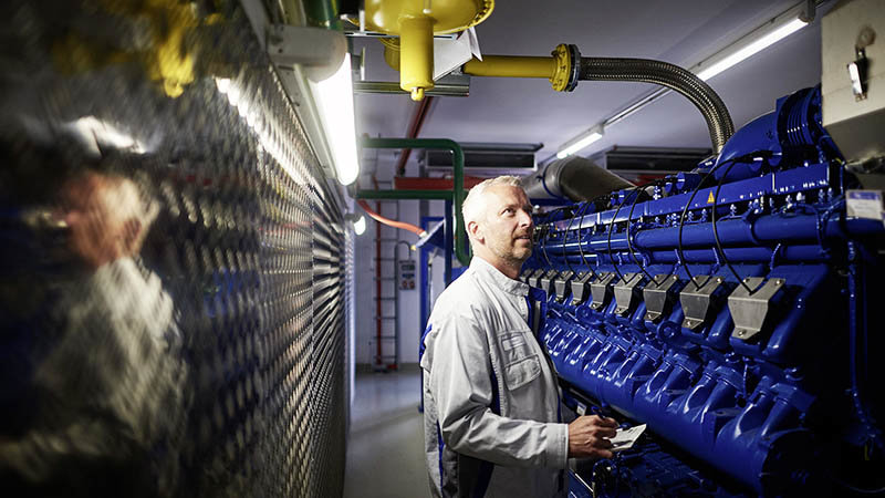Daniel Weiß, technical specialist, in the in-house combined heat and power plant.