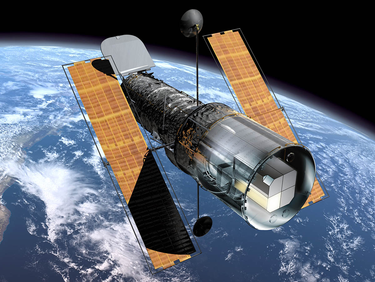 This illustration shows the NASA/ESA Hubble Space Telescope in orbit above the Earth as it looked before the Second Servicing Mission in 1997. The Faint Object Spectrograph (FOS) can be seen (marked in yellow) in Hubble's instrument bay at the back of the observatory. During the Second Servicing Mission the two first generation instruments, FOS and the Goddard High Resolution Spectrograph (GHRS), were replaced by the second generation instruments, NICMOS (Near Infrared Camera and Multi-Object Spectrometer) and STIS (Space Telescope Imaging Spectrograph). A dedicated team effort to understand and correct systematic effects in observations from FOS has now been concluded and the results are released on 11 September 2001. A four-person team based at the Space Telescope-European Coordinating Facility (ST-ECF) in Garching, Germany, has carried out this re-calibration with support from scientists at the Space Telescope Science Institute and the Goddard Space Flight Center. ST-ECF's 'Instrument Physical Modelling Group' has expended ten man-years of effort in understanding the intricate details of the instrument and in developing a novel physical model of its operation. This has allowed them to develop routines to correct for unwanted instrumental and environmental effects in the measurements of stars and galaxies.